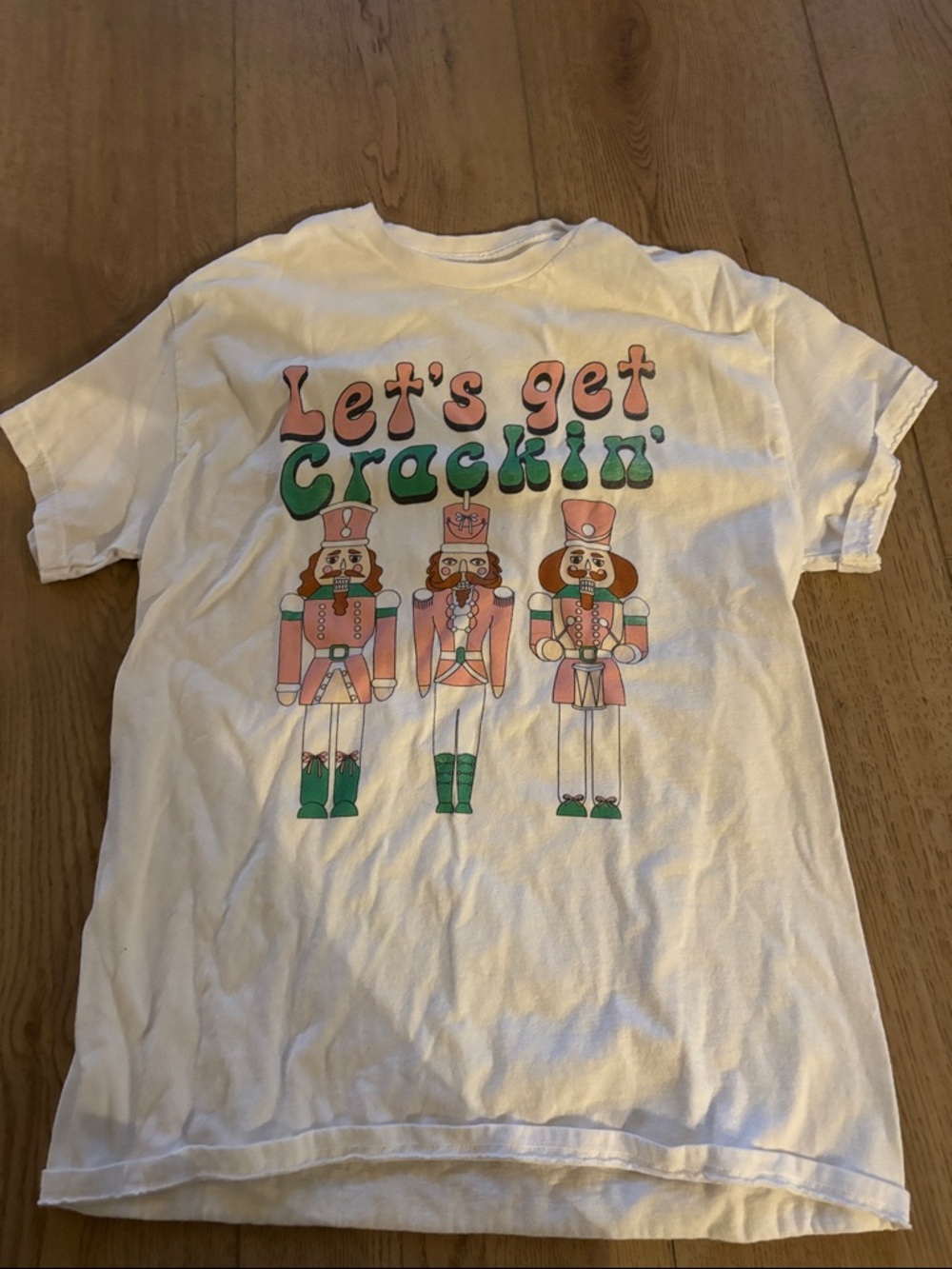 Women's White Graphic Tee "Let's Get Crackin'"